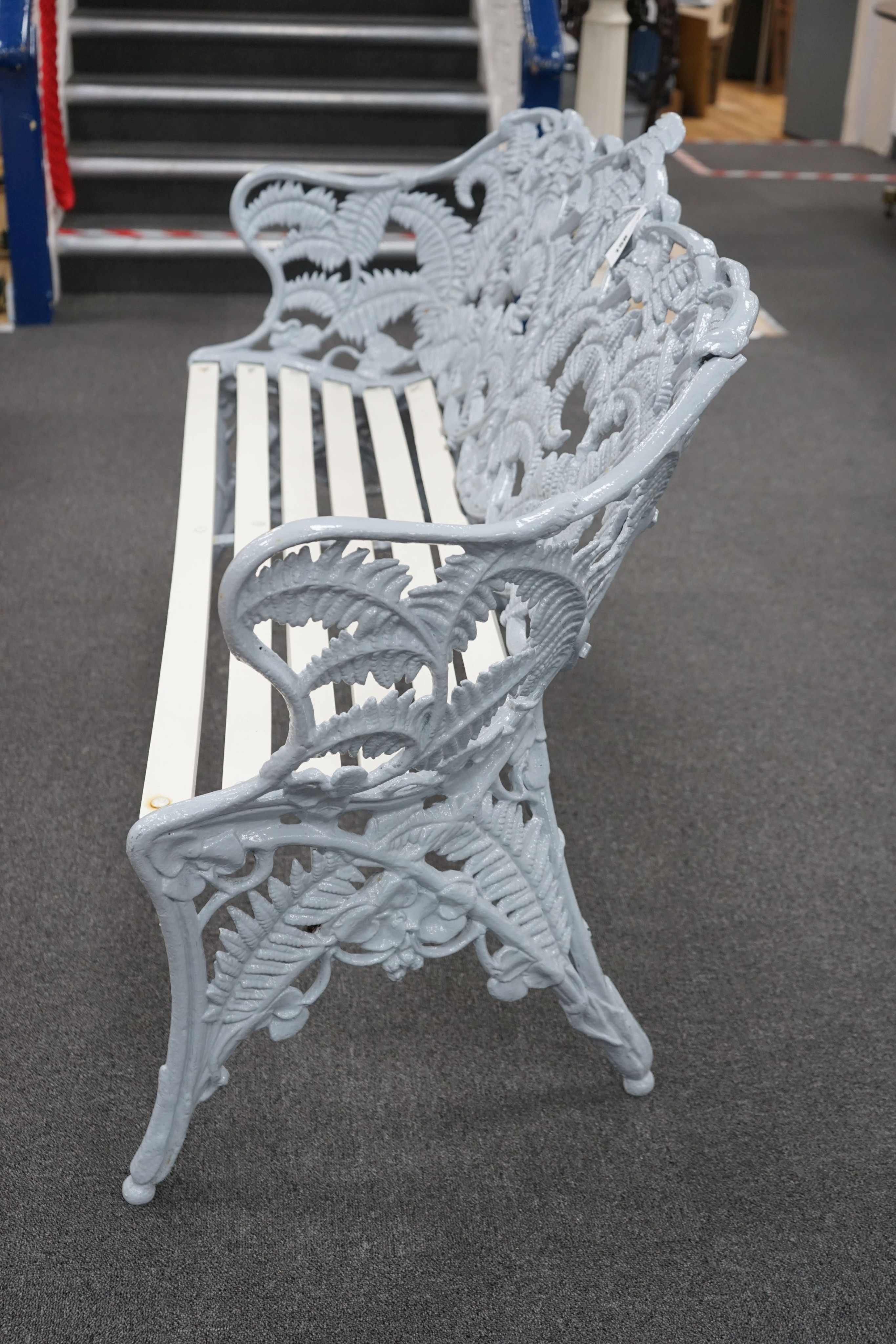 A Victorian Coalbrookdale cast iron Fern pattern garden bench, repainted and with a re-slatted wood seat, length 152cm, depth 56cm, height 94cm